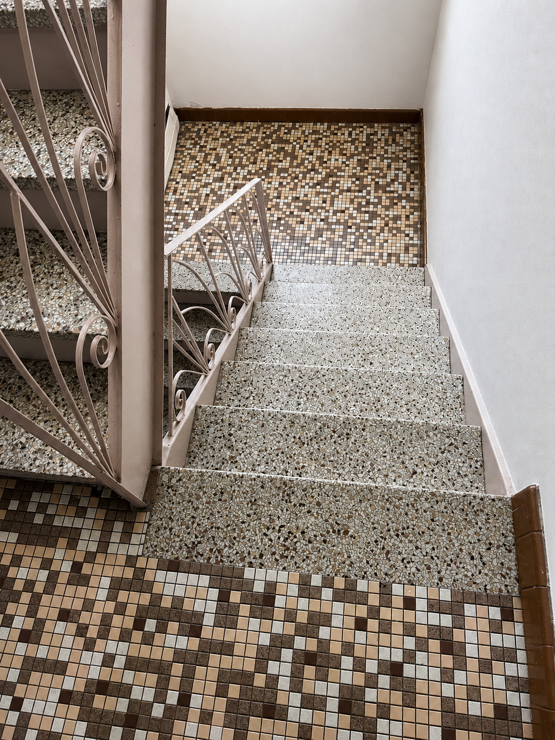 Clean condo stairwell and landing.